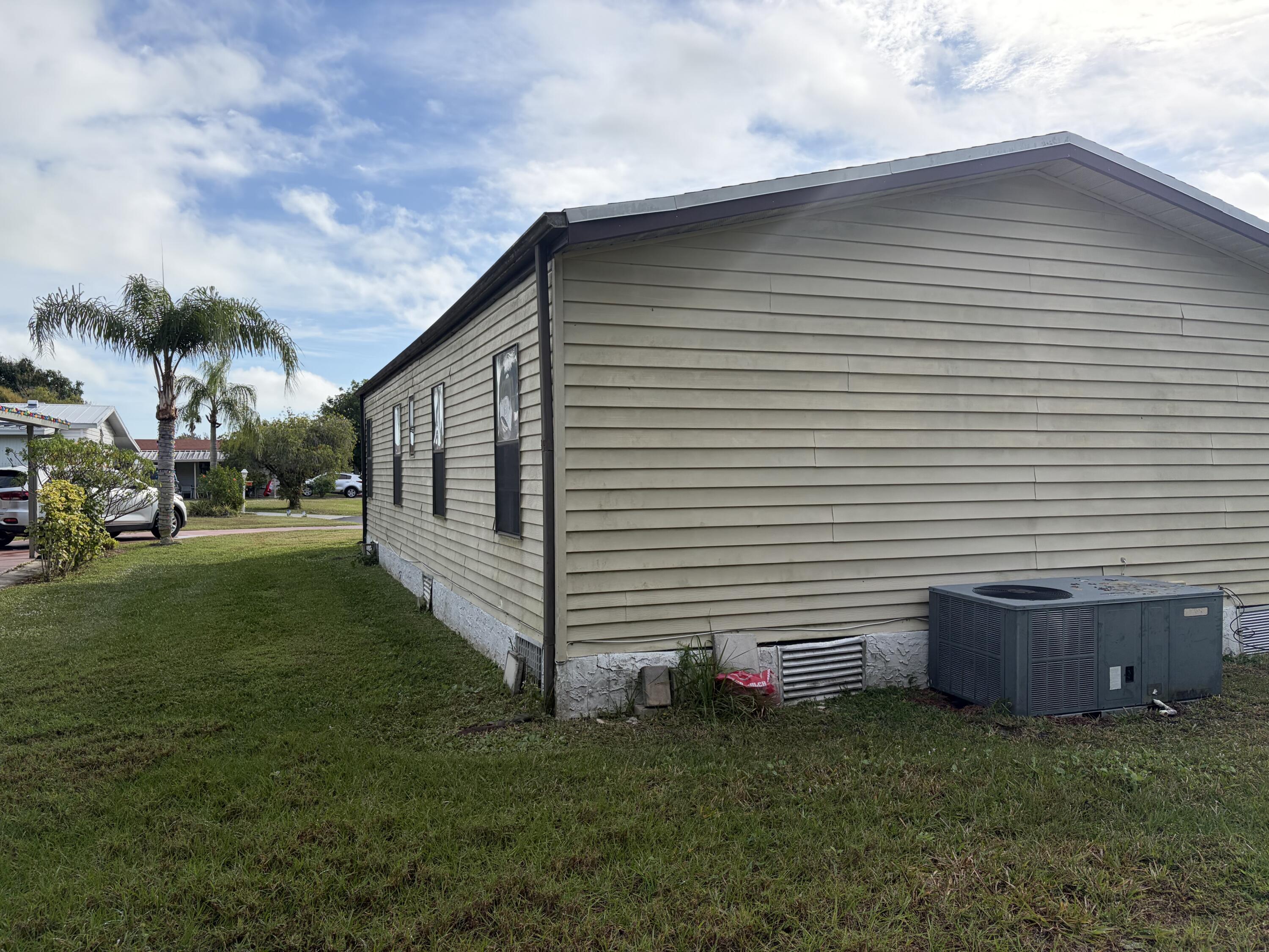202 Travis Cay Place, Unit 9 Fort Pierce, FL 34982 - Photo 3 of 34 IMG_3240