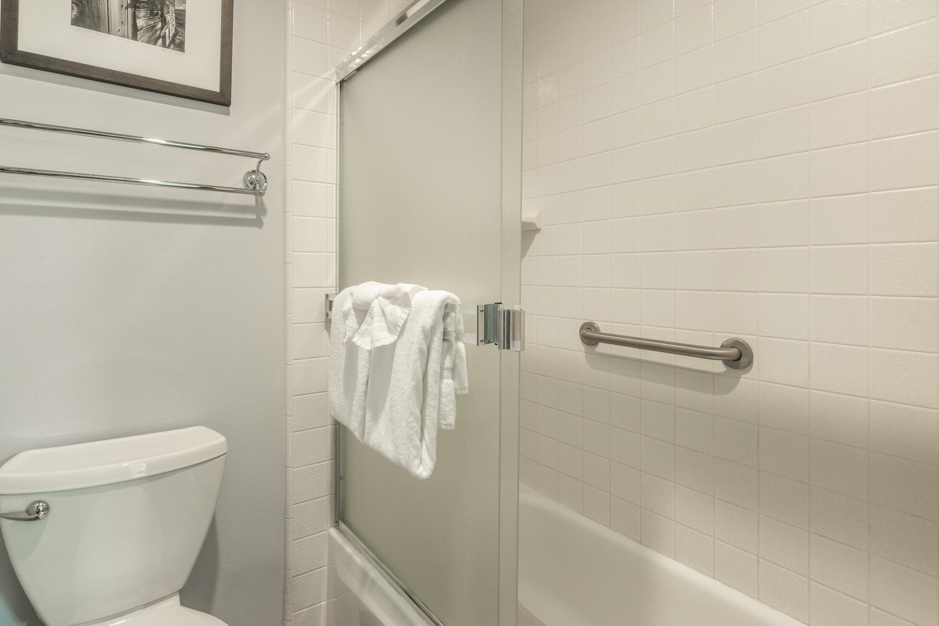 2 Arrowhead Drive, Unit 27 Mammoth Lakes, CA 93546 - Photo 14 of 26 a bathroom with a toilet and a shower