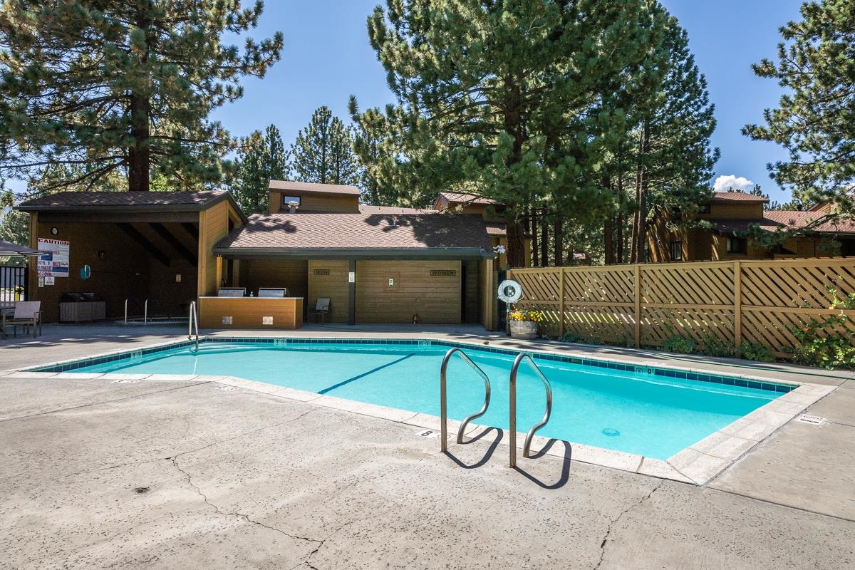2 Arrowhead Drive, Unit 27 Mammoth Lakes, CA 93546 - Photo 23 of 26 a view of a tennis ground with large trees