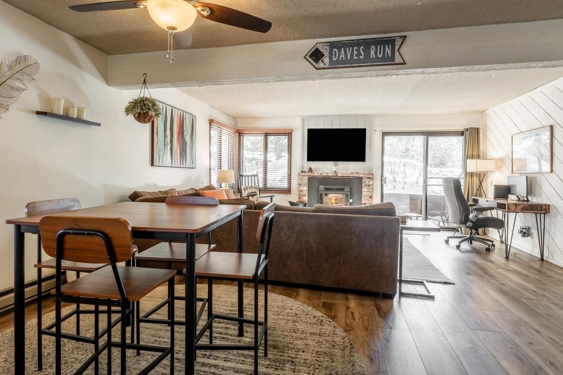 2 Arrowhead Drive, Unit 27 Mammoth Lakes, CA 93546 - Photo 7 of 26 a living room with furniture and a flat screen tv