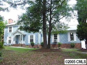 1524 Waterford Place Fort Mill, SC 29708 - Photo 1 of 8 a front view of a house with a yard