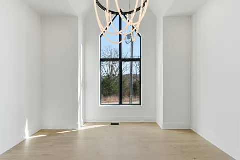 an empty room with windows