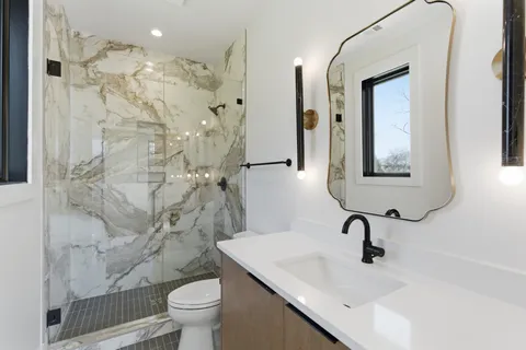 a view of a livingroom with wooden floor and closet