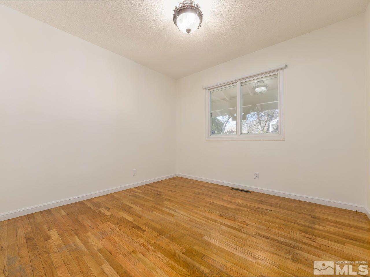 4620 Azalea Drive Reno, NV 89502 - Photo 14 of 19 an empty room with a window
