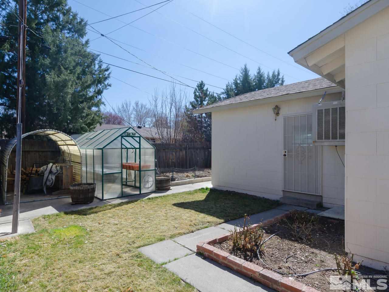 4620 Azalea Drive Reno, NV 89502 - Photo 17 of 19 a view of a house with a yard