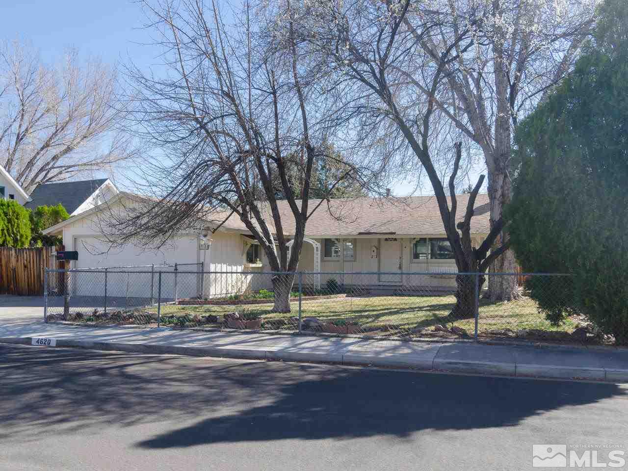 4620 Azalea Drive Reno, NV 89502 - Photo 5 of 19 a view of a yard in front of a house