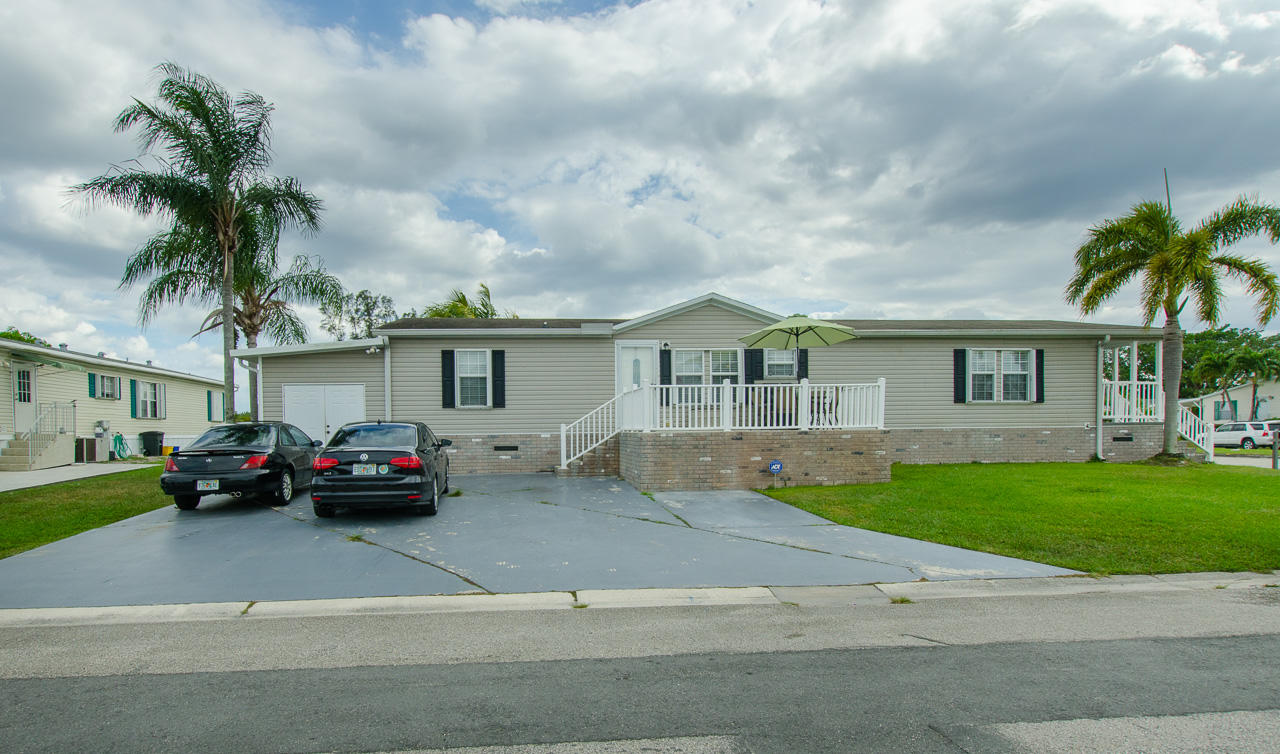 1760 Southwest 65th Avenue Boca Raton, FL 33428 - Photo 1 of 32 front