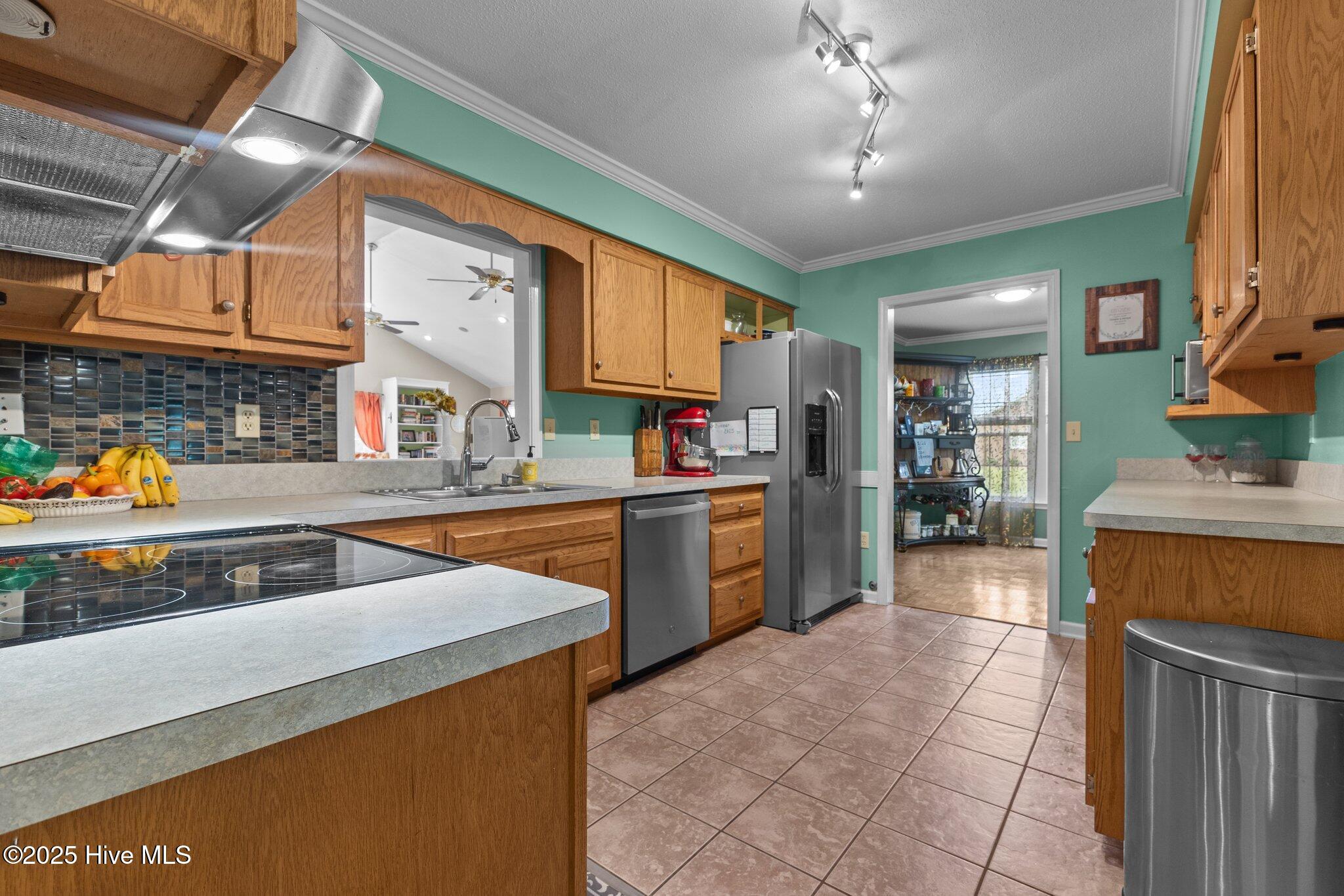 1033 Pearson Road Clinton, NC 28328 - Photo 11 of 59 Kitchen overlooks family room