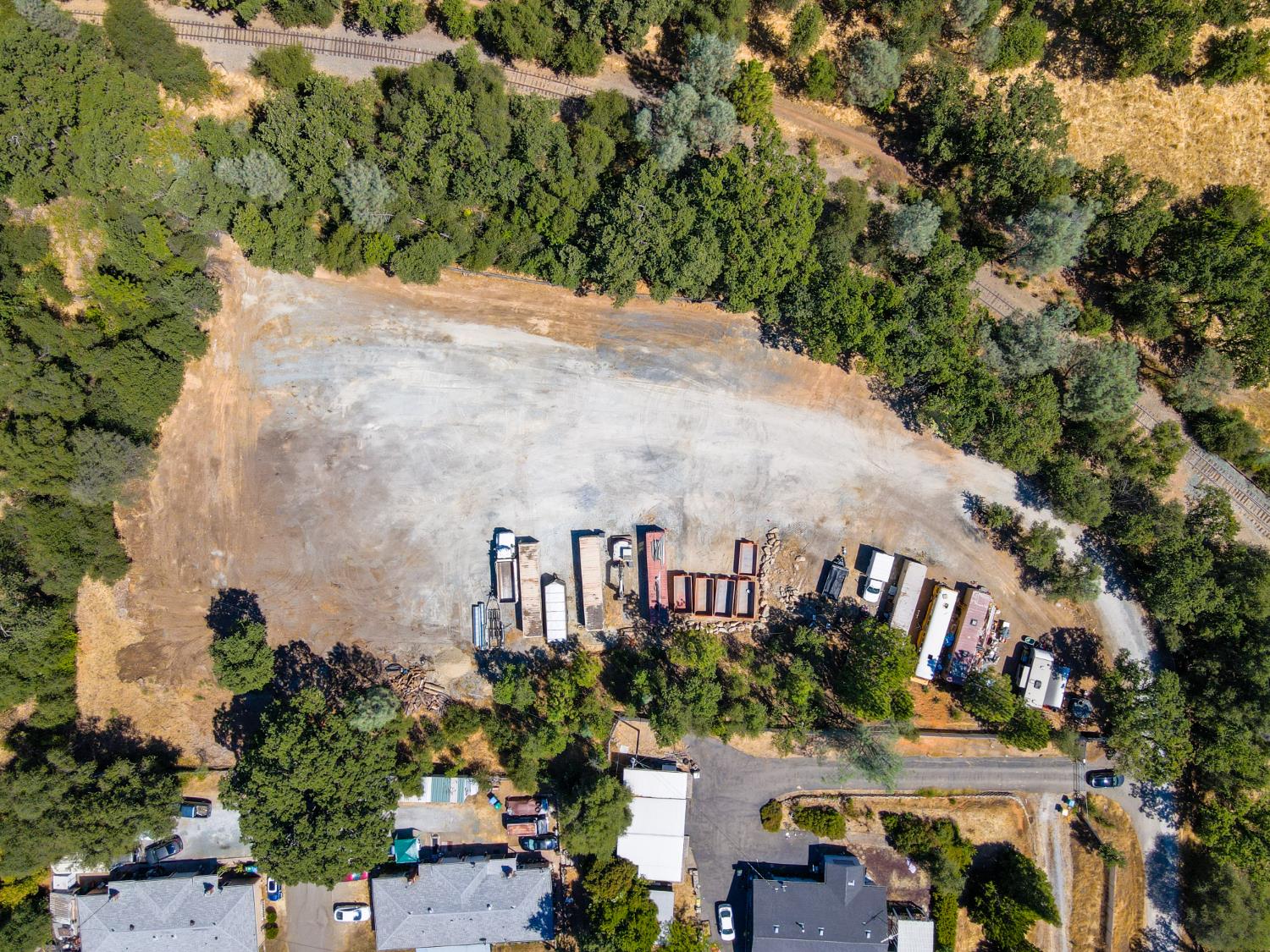 6069 Pleasant Valley Road El Dorado, CA 95623 - Photo 4 of 10 an aerial view of a house with a yard and garden