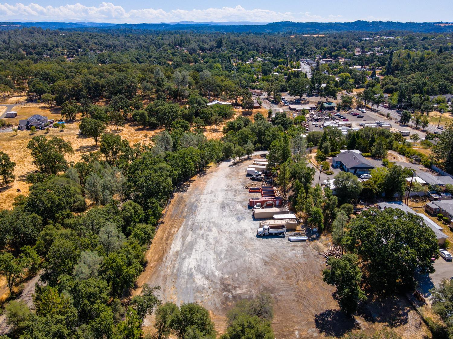 6069 Pleasant Valley Road El Dorado, CA 95623 - Photo 6 of 10 an aerial view of a city with lots of residential buildings