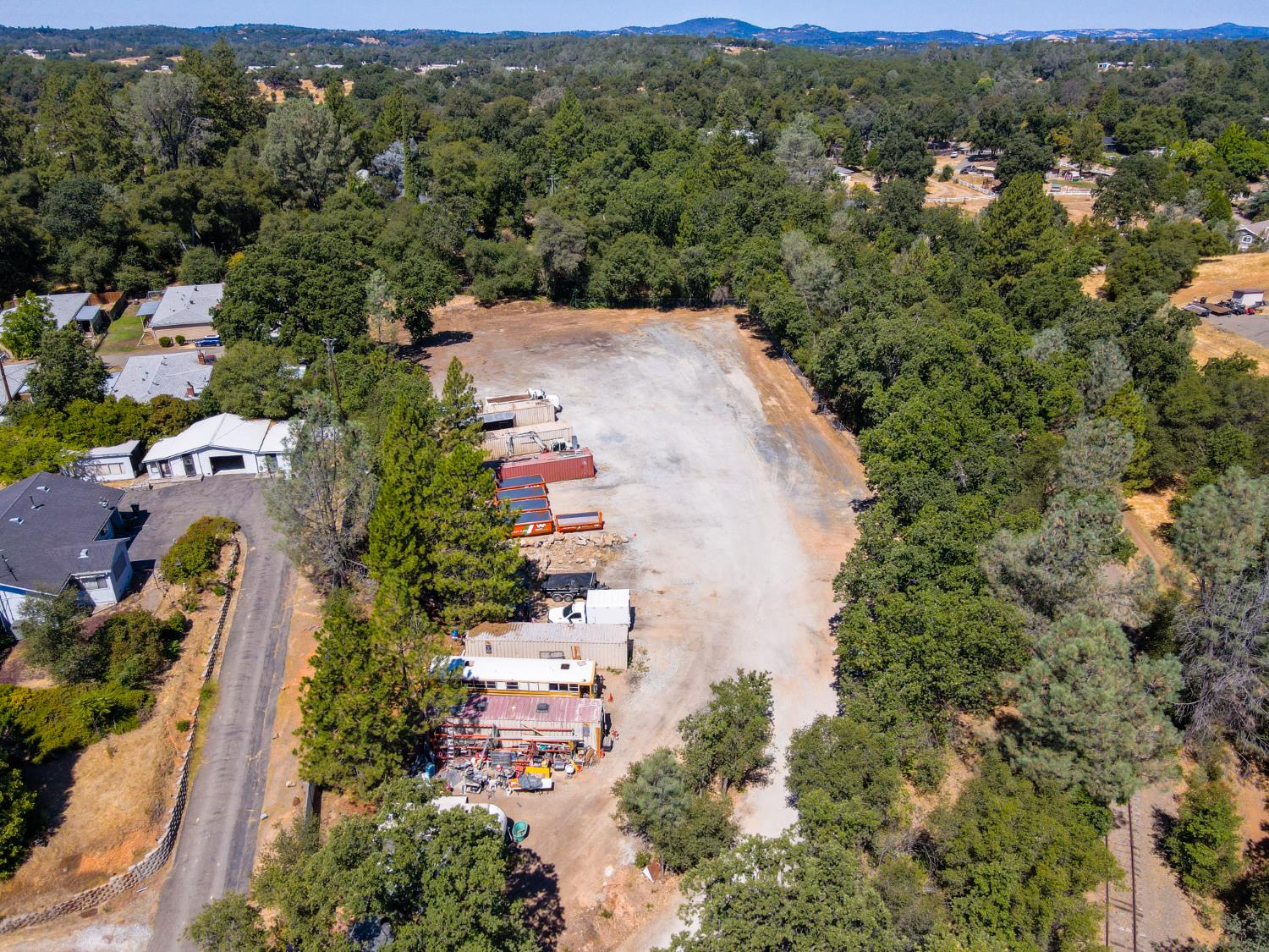 6069 Pleasant Valley Road El Dorado, CA 95623 - Photo 9 of 10 an aerial view of a house with a yard