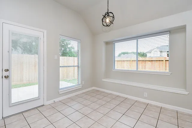 an empty room with a window