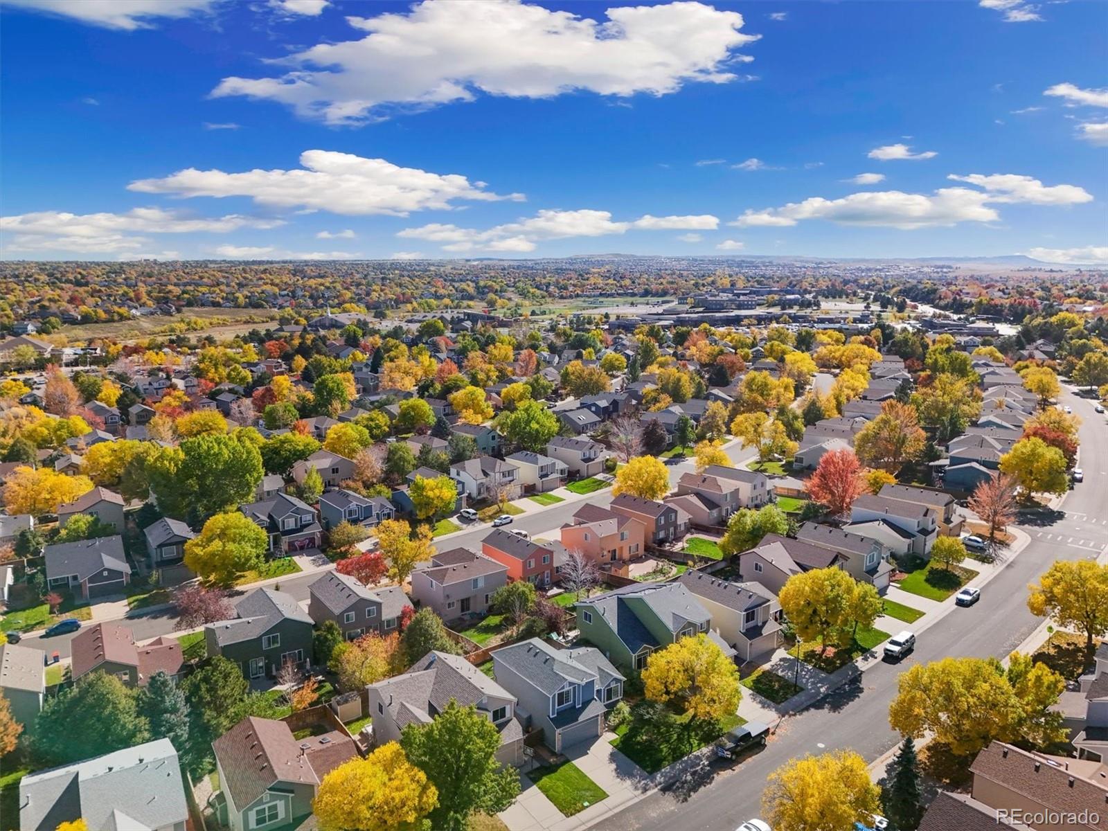 9823 South Castle Ridge Circle Highlands Ranch, CO 80129 - Photo 36 of 46 an aerial view of a city