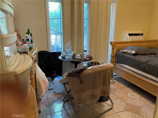 a bathroom with a sink toilet and a mirror