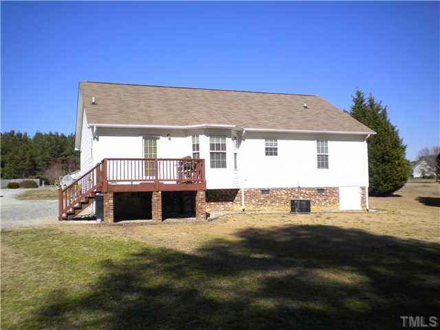 115 Forest Ridge Drive Willow Spring, NC 27592 - Photo 15 of 17 a view of house with outdoor space