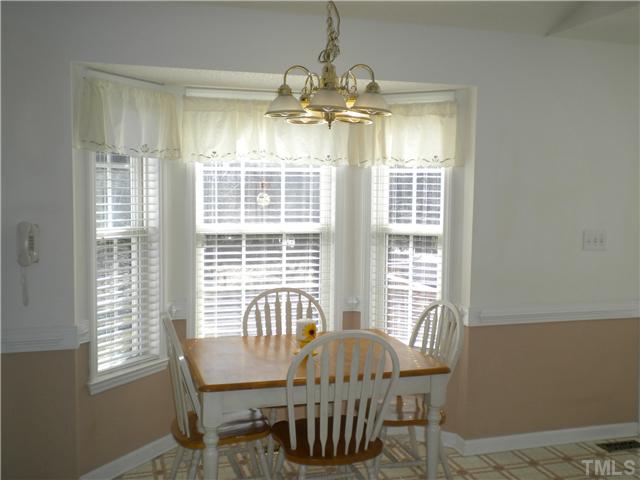 115 Forest Ridge Drive Willow Spring, NC 27592 - Photo 4 of 17 a view of a dining room with furniture window and outside view