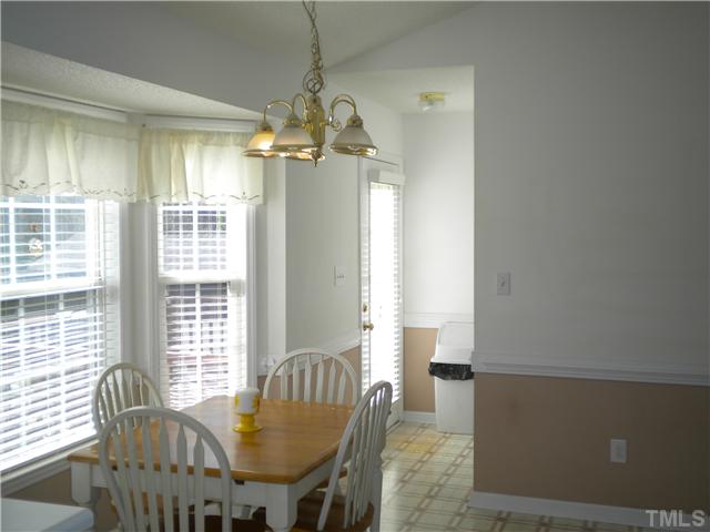 115 Forest Ridge Drive Willow Spring, NC 27592 - Photo 6 of 17 a view of a dining room with furniture window and outside view
