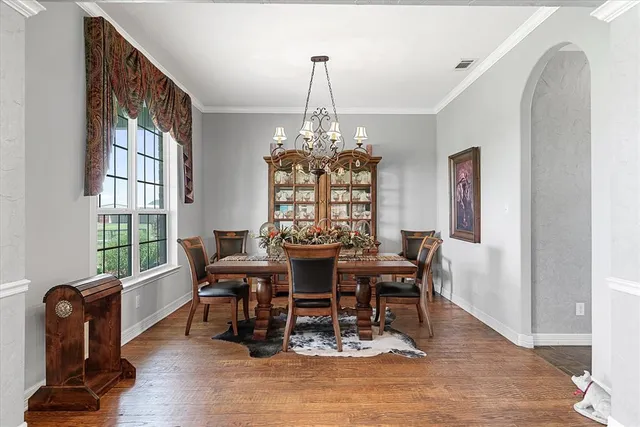 a view of a hallway with a living room