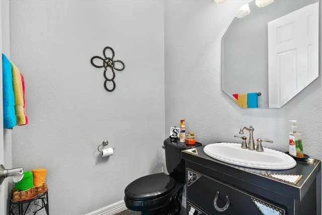 a living room with fireplace furniture and a flat screen tv