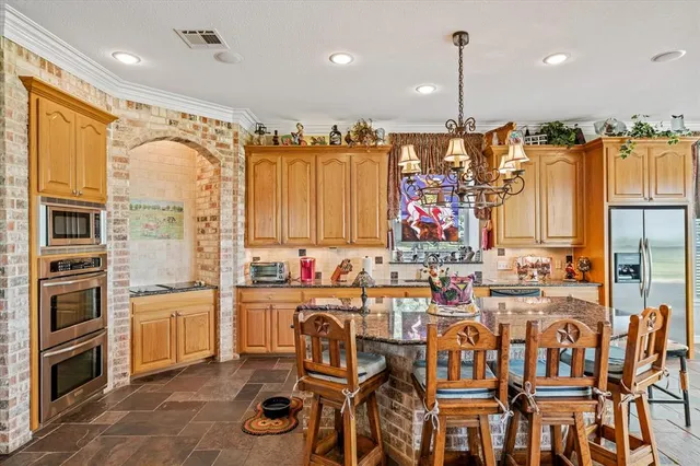 a view of a dining room with furniture window and chandelier