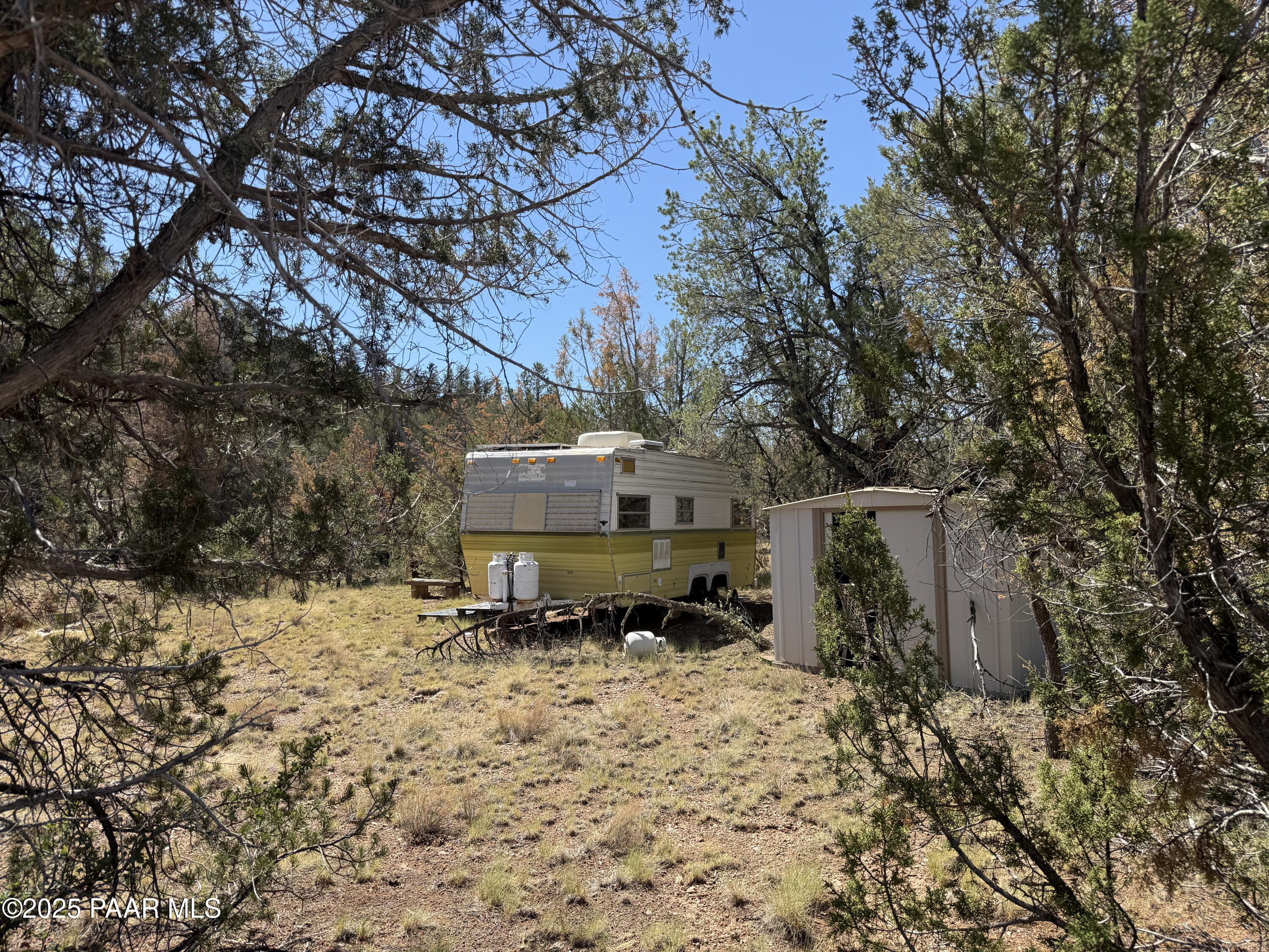 Lot 99 Shadow Rock Ranch Seligman, AZ 86337 - Photo 3 of 17 a view of a backyard of the house
