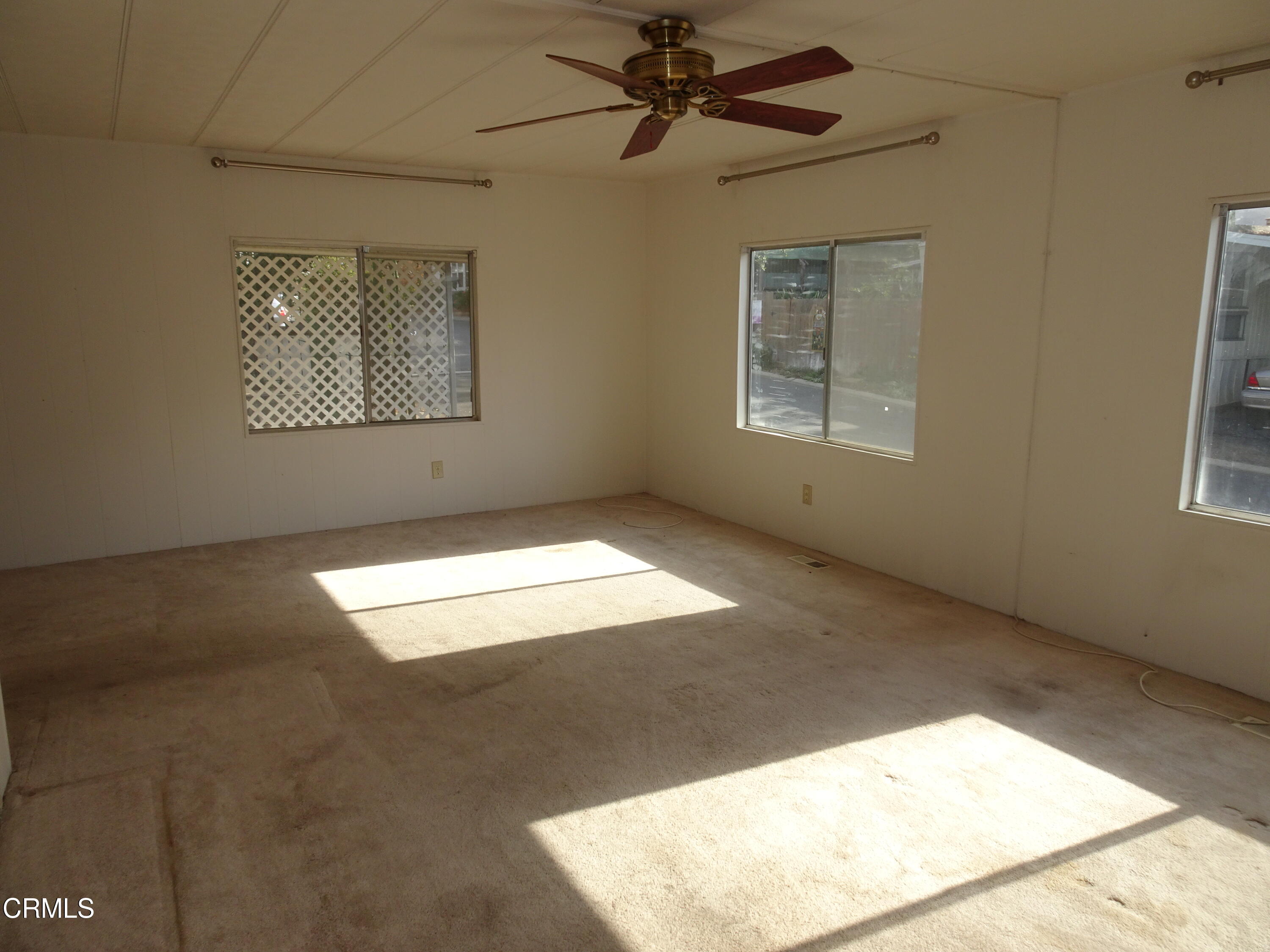 1225 South Rice Road, Unit 28 Ojai, CA 93023 - Photo 14 of 27 an empty room with windows