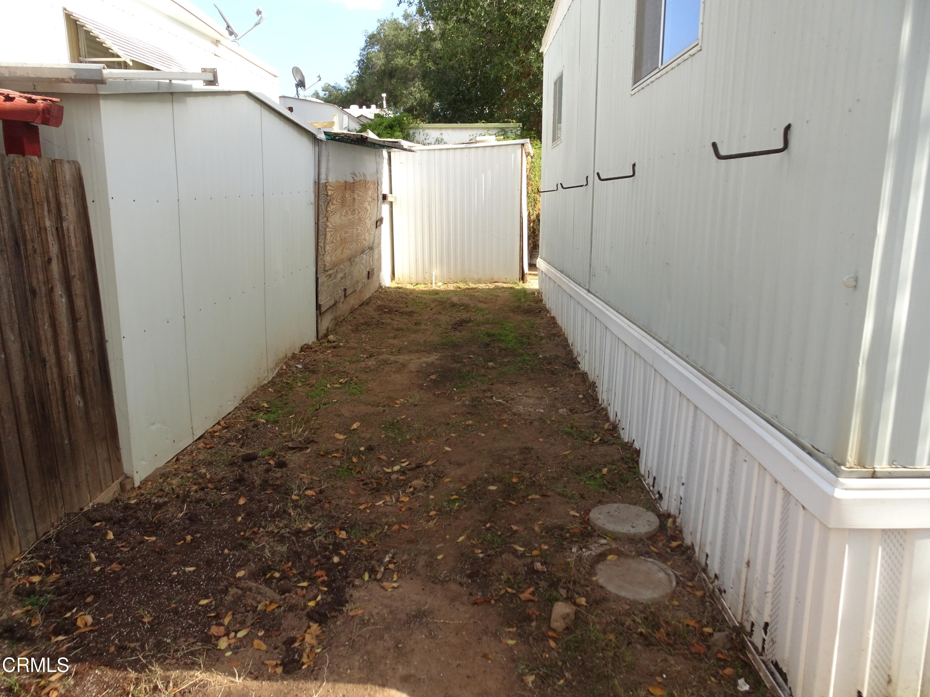 1225 South Rice Road, Unit 28 Ojai, CA 93023 - Photo 8 of 27 a view of a house with wooden fence