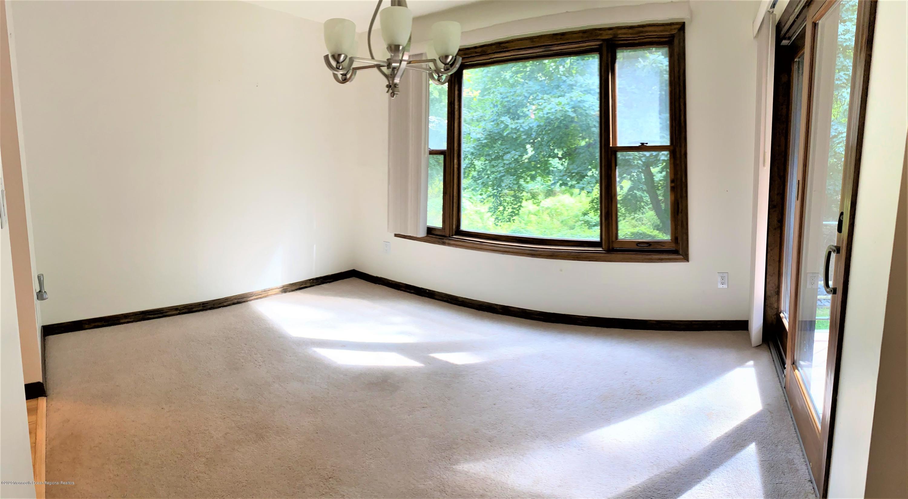 200 Portland Road, Unit D20 Highlands, NJ 07732 - Photo 5 of 10 an empty room with a window
