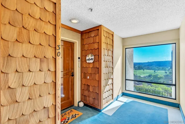 a view of an entryway with a garden