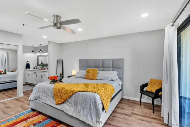 a bed room with a bed and furniture