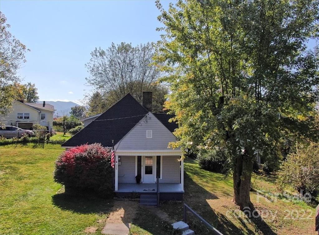 206 Star Ridge Road Canton, NC 28716 - Photo 2 of 29 a front view of a house with garden