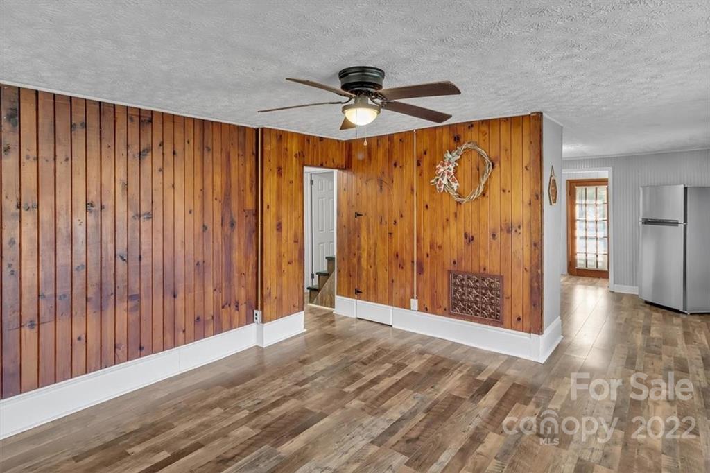 206 Star Ridge Road Canton, NC 28716 - Photo 10 of 29 a view of an empty room and wooden floor