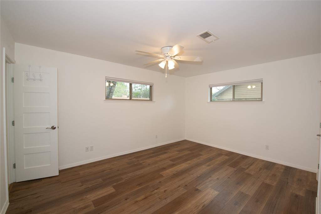 2124 Ridge Lane Grapevine, TX 76051 - Photo 12 of 17 Spare room featuring dark wood-type flooring and ceiling fan