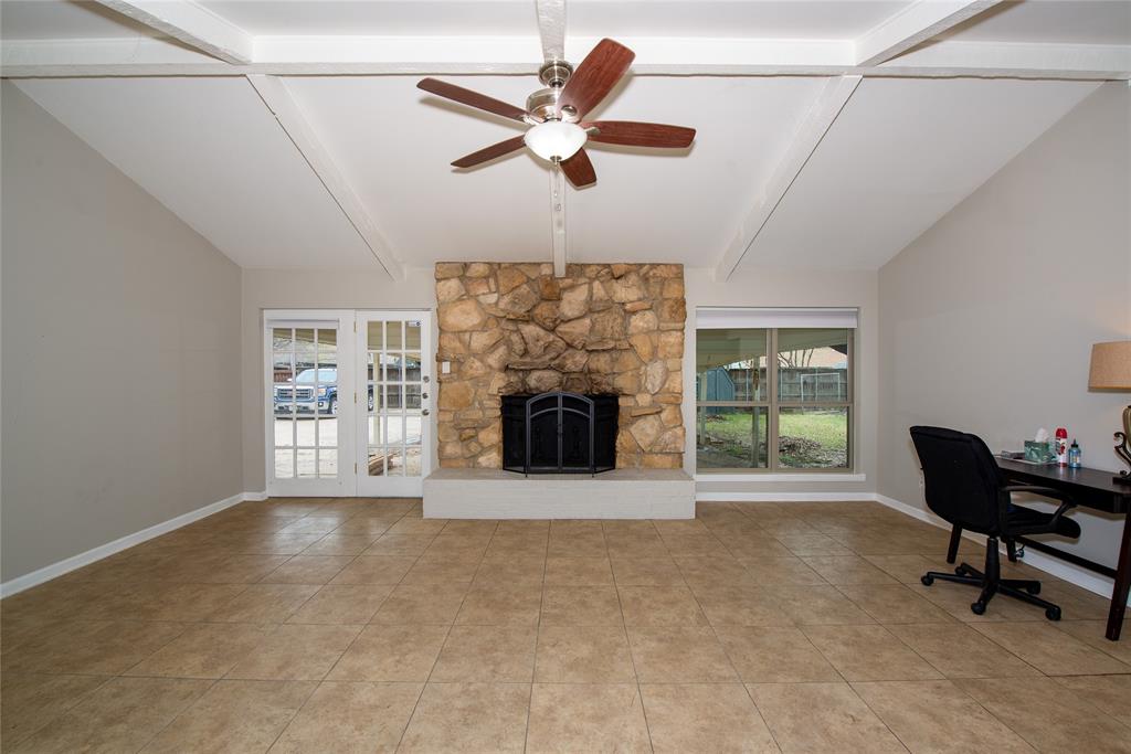 2124 Ridge Lane Grapevine, TX 76051 - Photo 12 of 23 a living room with furniture and a fireplace