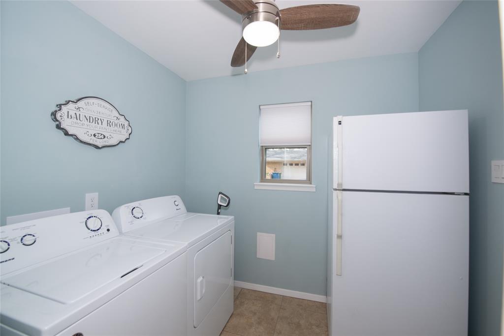 2124 Ridge Lane Grapevine, TX 76051 - Photo 10 of 23 a utility room with dryer and washer