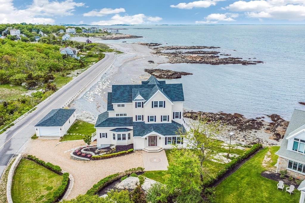 an aerial view of a house with outdoor space