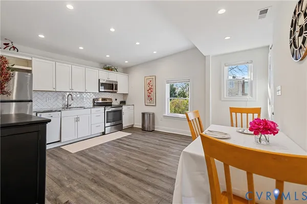 a kitchen with granite countertop lots of counter top space