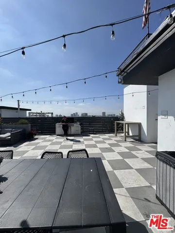 a view of a kitchen with a sink