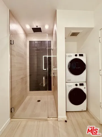 a bathroom with a toilet and a sink