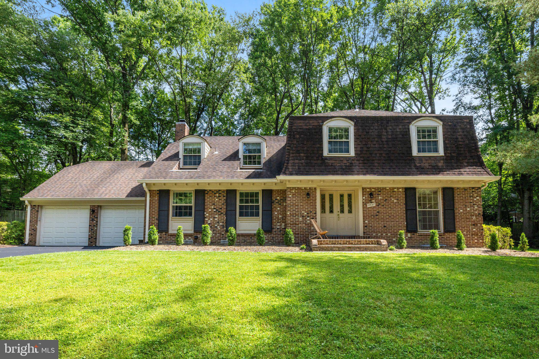 1427 Laurel Hill Road Vienna, VA 22182 - Photo 1 of 57 Charming home nestled in lush greenery.
