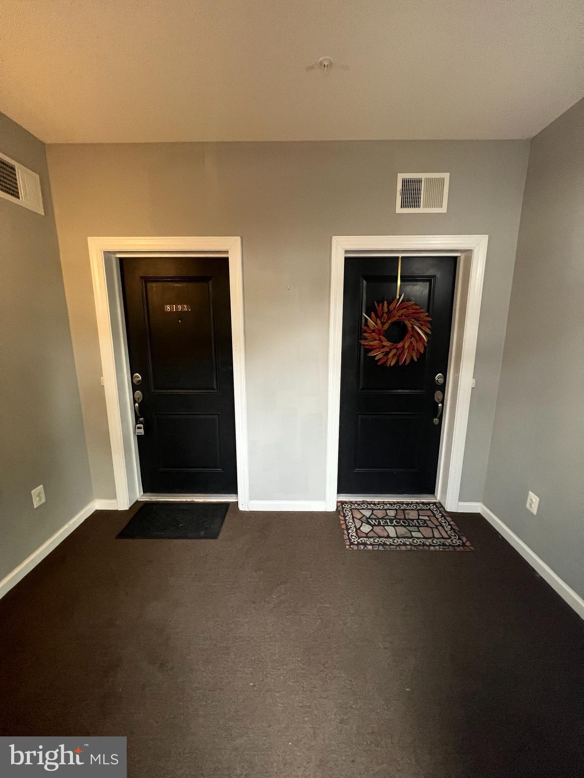 8193 Falls Grove Drive Manassas, VA 20111 - Photo 2 of 27 a view of an empty room with a fireplace