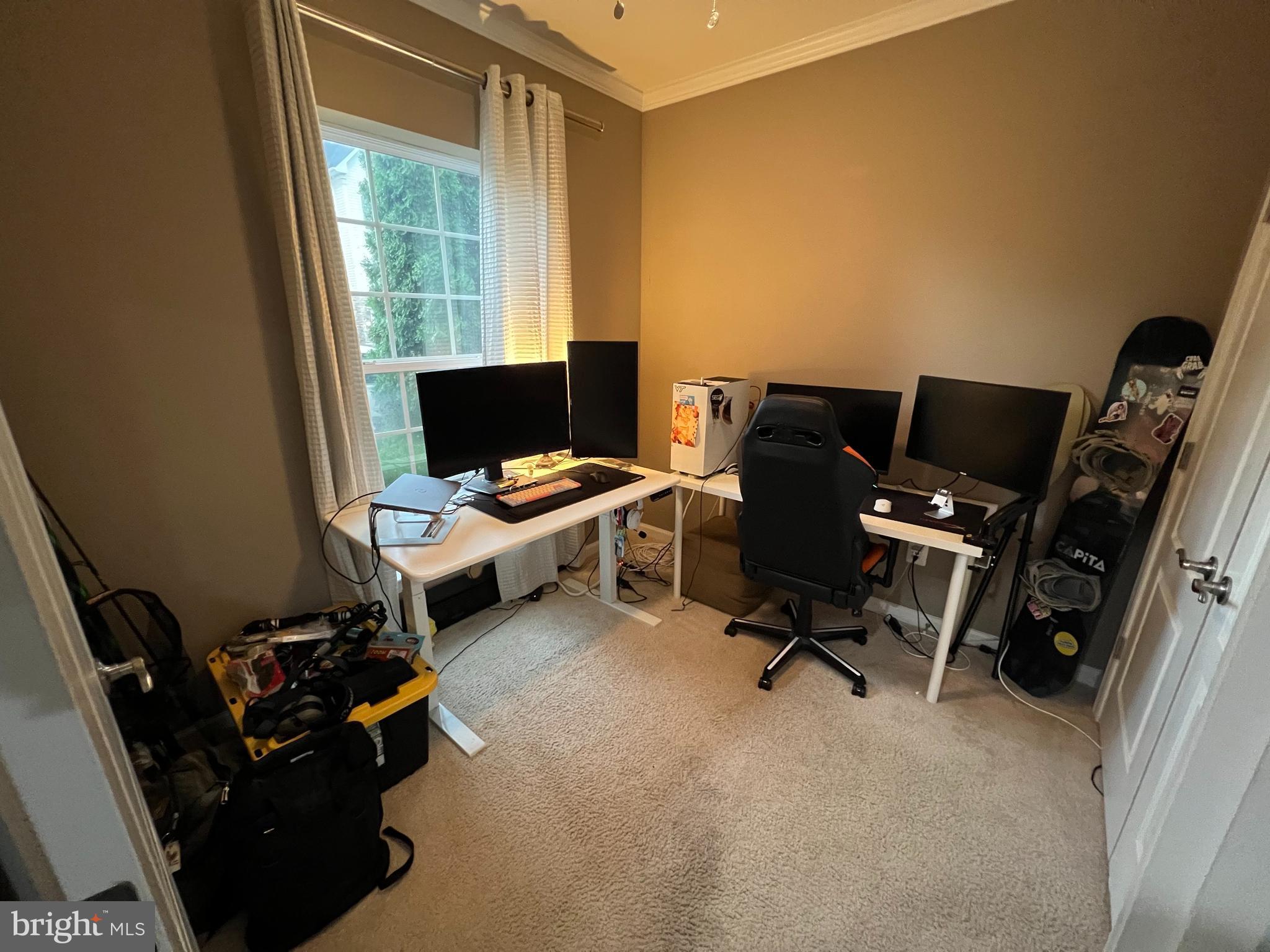 8193 Falls Grove Drive Manassas, VA 20111 - Photo 7 of 27 a view of a workspace with furniture and a window