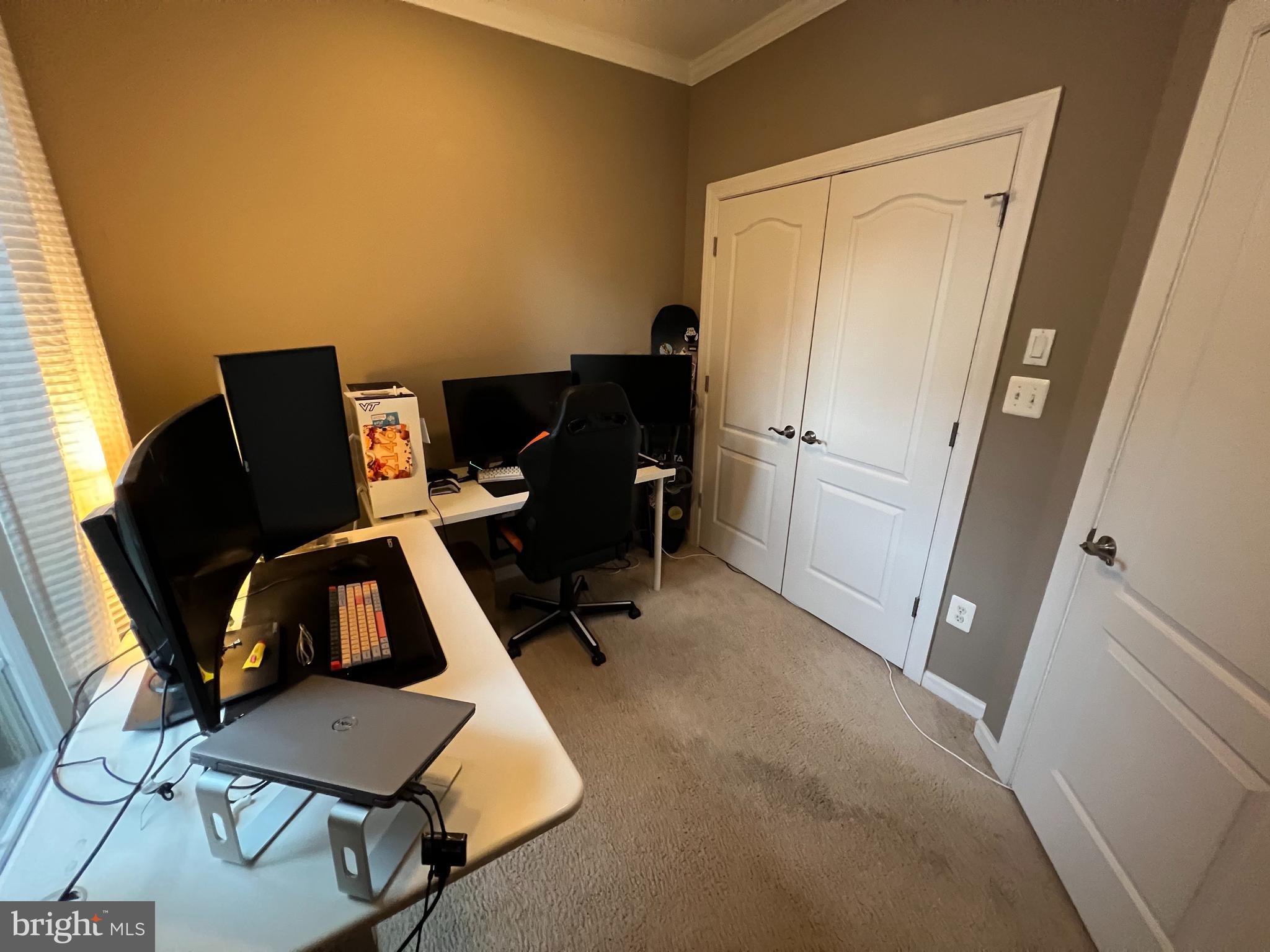 8193 Falls Grove Drive Manassas, VA 20111 - Photo 8 of 27 a workspace with furniture and wooden floor