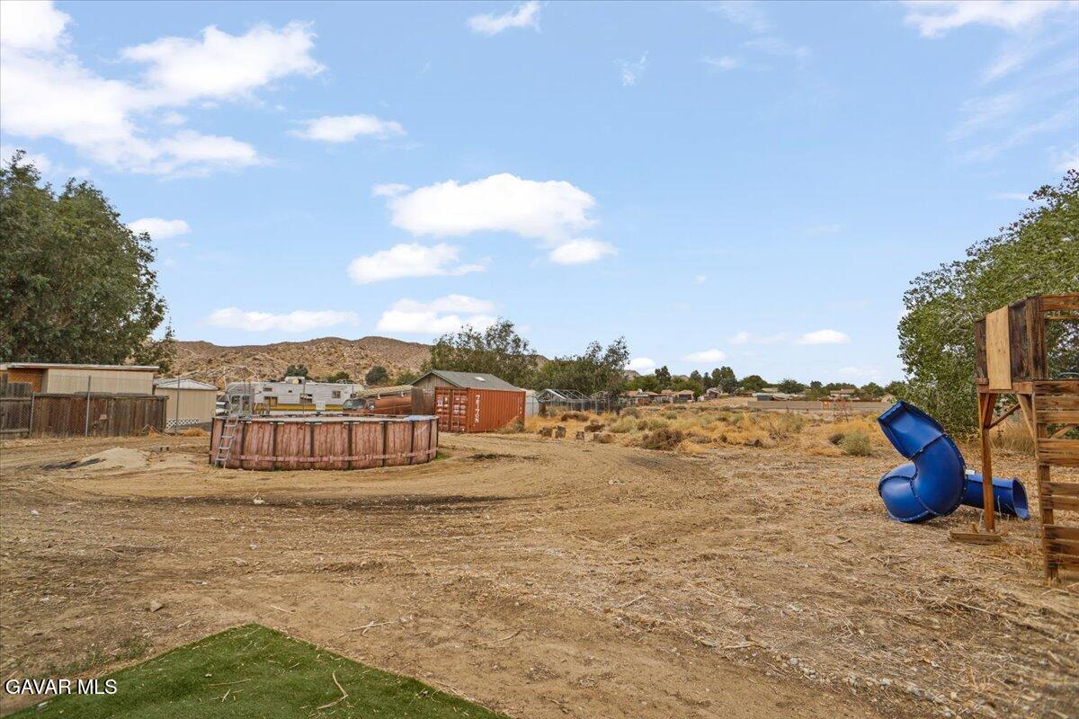 40287 Fieldspring Street Palmdale, CA 93591 - Photo 12 of 15 a view of a lake with houses