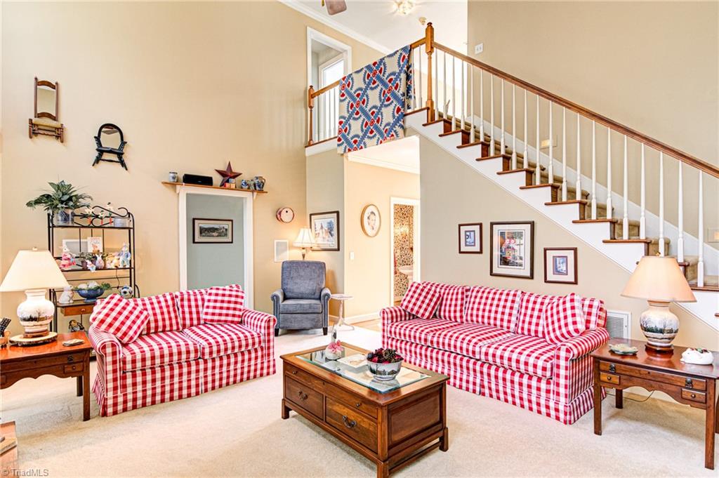 4511 Calabria Court High Point, NC 27265 - Photo 12 of 40 Great room is two-story. Main stairway to 2nd floor and loft above that also overlooks the foyer.