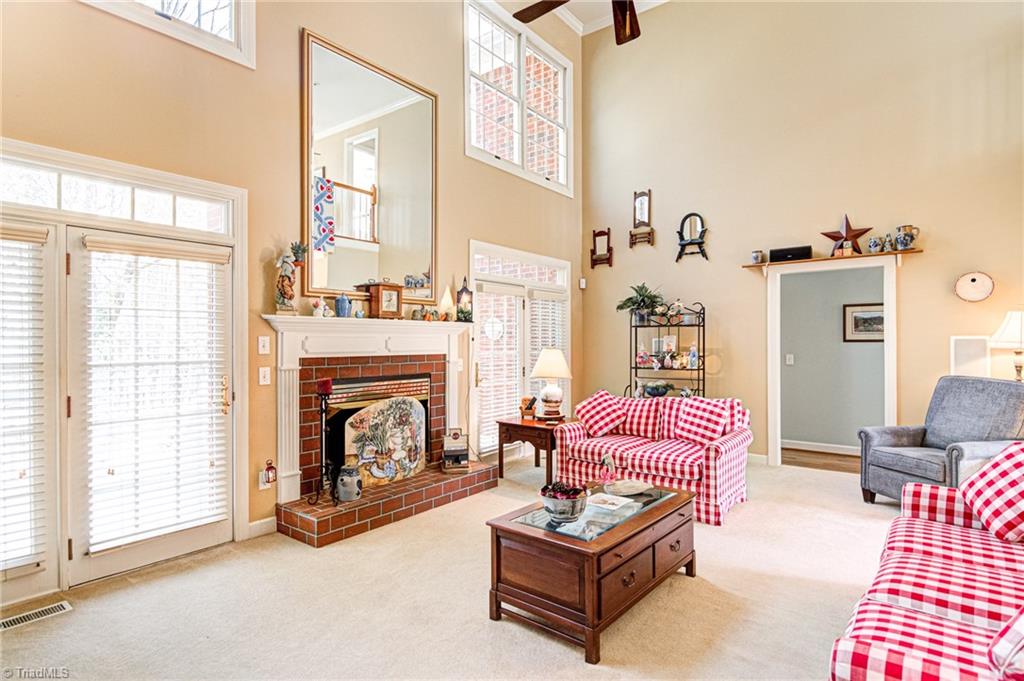 4511 Calabria Court High Point, NC 27265 - Photo 13 of 40 Lots of natural light from the great room's large atrium doors and upper windows.