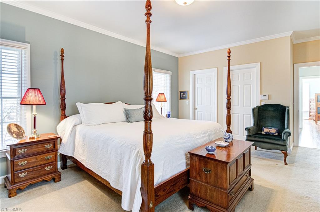 4511 Calabria Court High Point, NC 27265 - Photo 20 of 40 Double walk-in closets in main level primary bedroom