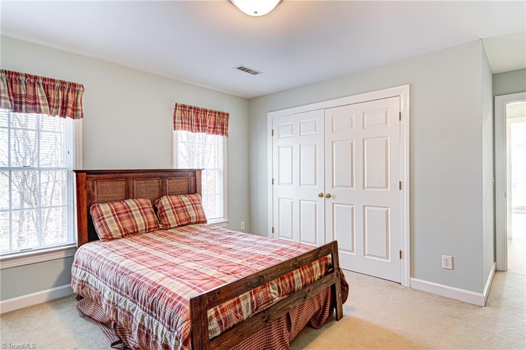 4511 Calabria Court High Point, NC 27265 - Photo 28 of 40 Bedroom with double wide closets.