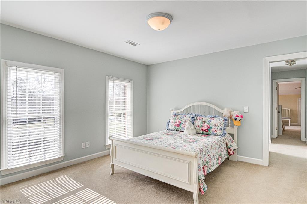 4511 Calabria Court High Point, NC 27265 - Photo 33 of 40 3rd upstairs bedroom with it's own adjacent bathroom.