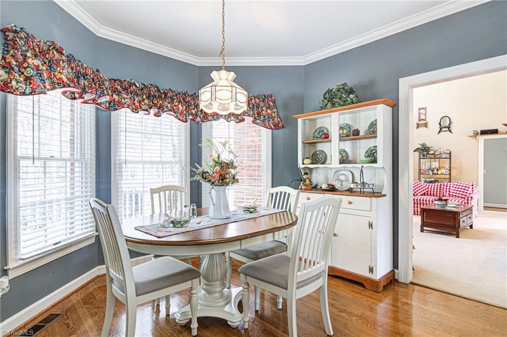 4511 Calabria Court High Point, NC 27265 - Photo 10 of 40 Bay window breakfast area.